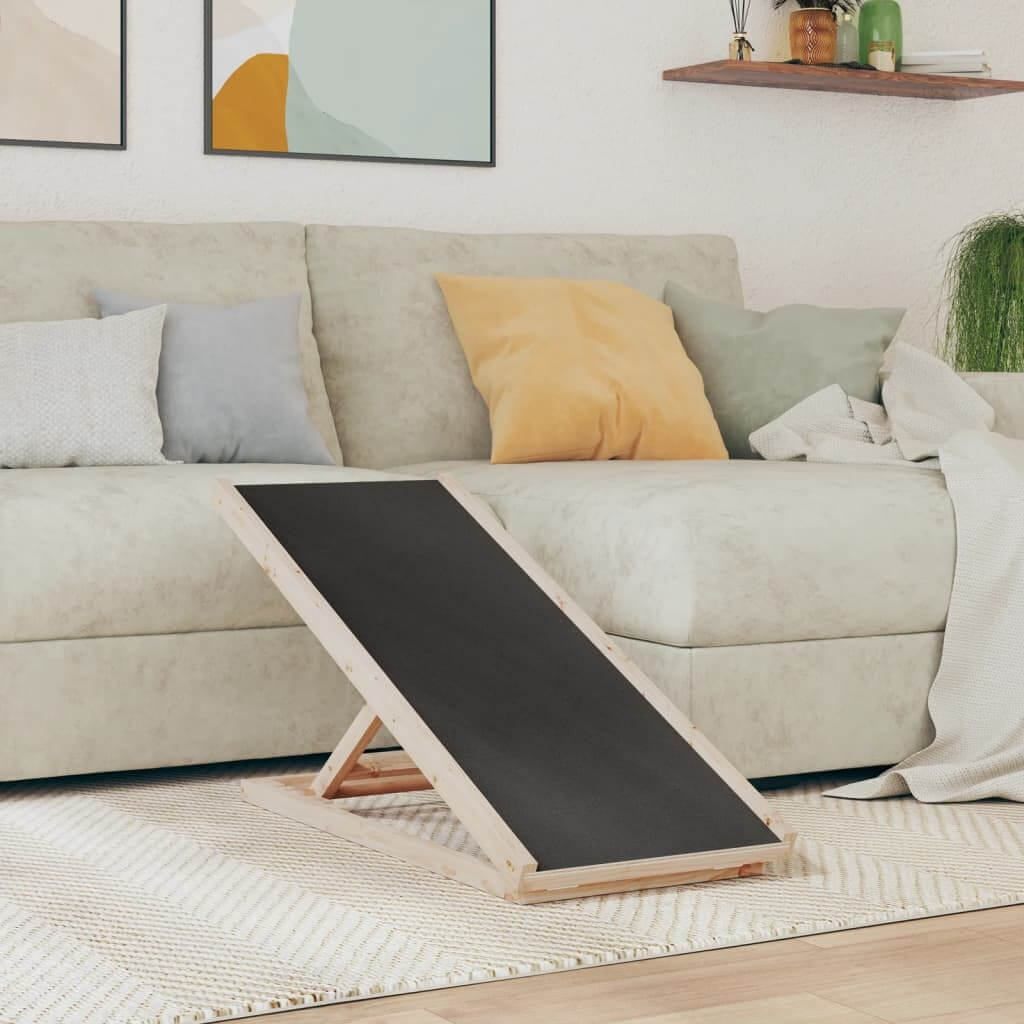 Wooden dog ramp in a living room setting with a sofa and cushions.