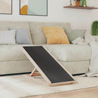 Wooden dog ramp in a living room setting with a sofa and cushions.