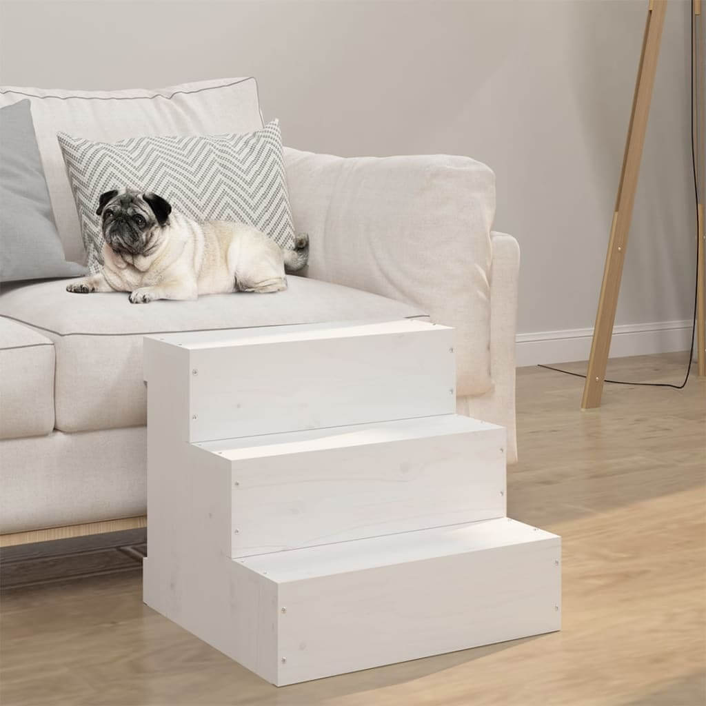 White dog steps leading up to a white couch with a pug on the steps.